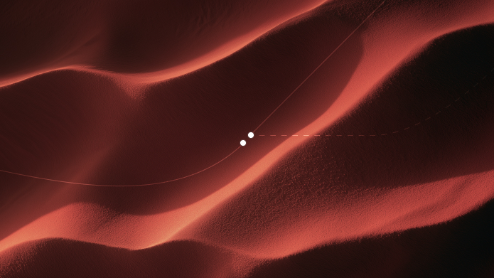 Red sand dunes with a route traced across them